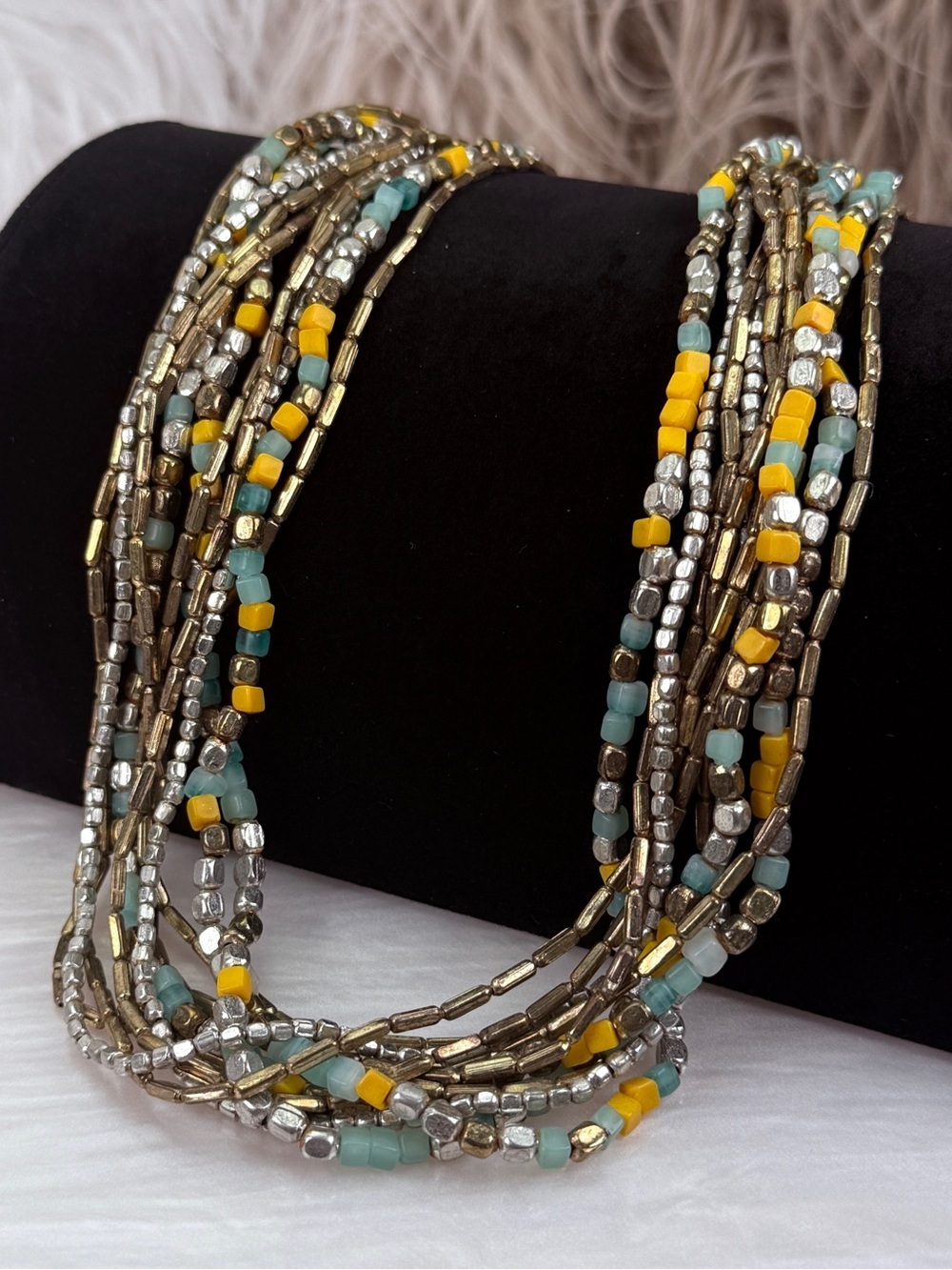 Beautiful weighted, multi tone multi strand bohemian chic long necklace